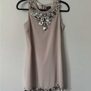 Elegant Beige Sleeveless Dress with Embellishments